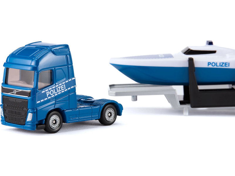 SIKU Super - tahač Volvo s člunem 1:87